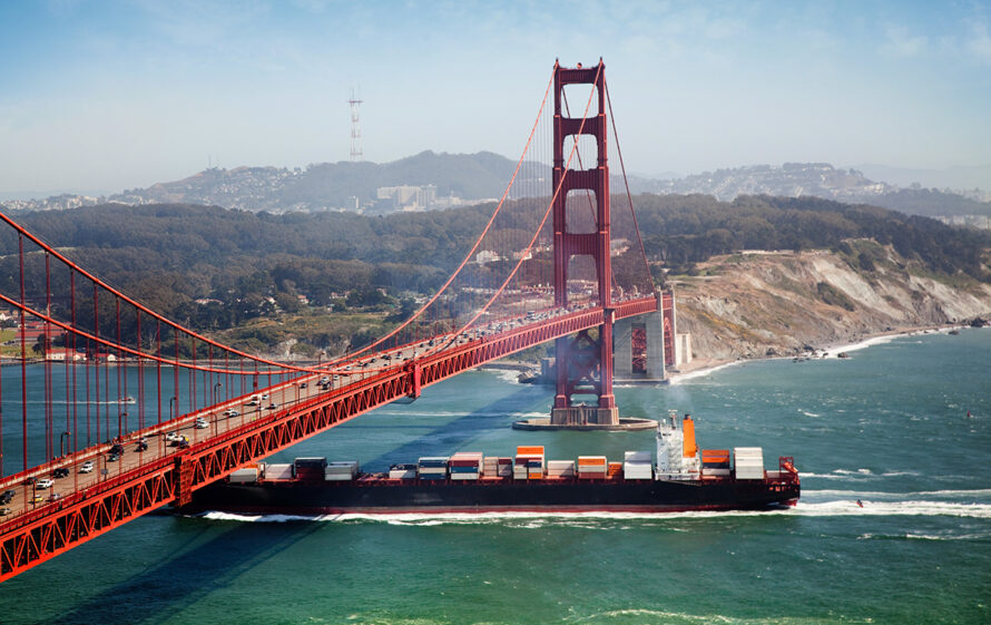 Container ship under Golden Gate Bridge in San Francisco.