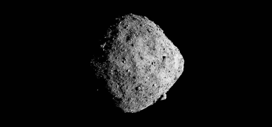 A light colored asteroid over a black background.